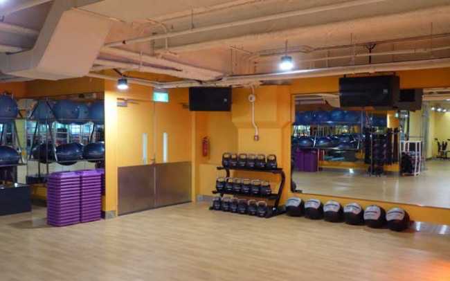 Pumping iron and playing rock at Celebrity Fitness
